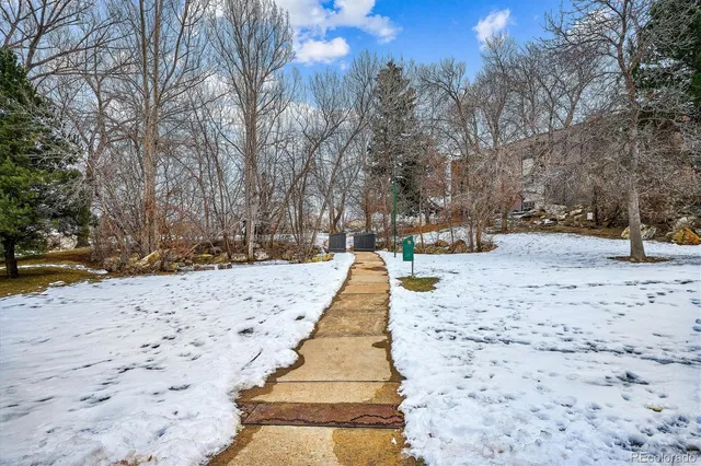 a view of pathway covered with snow