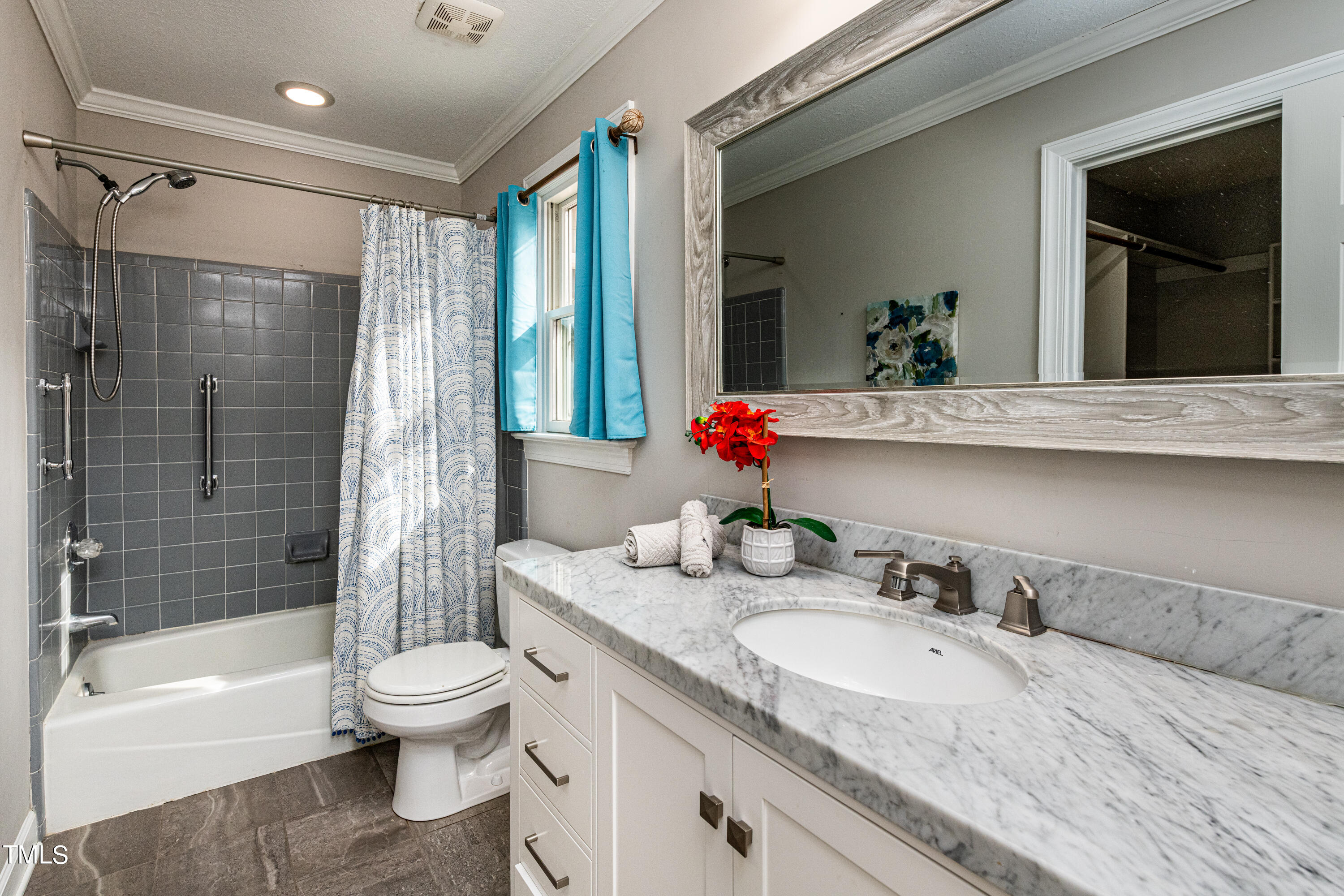 1416 Acres Way Raleigh, NC 27614 - Photo 23 of 48 a bathroom with a granite countertop sink mirror toilet and bathtub