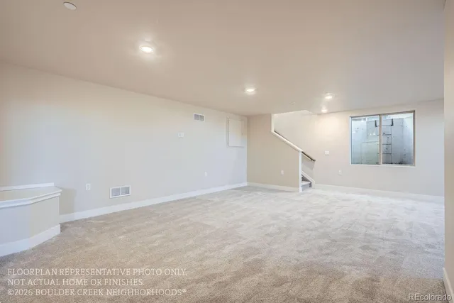 an empty room with a natural light
