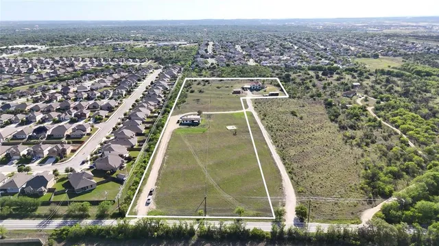 an aerial view of a residential houses