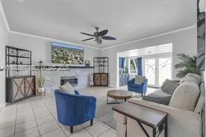 a kitchen with stainless steel appliances granite countertop a refrigerator and stove