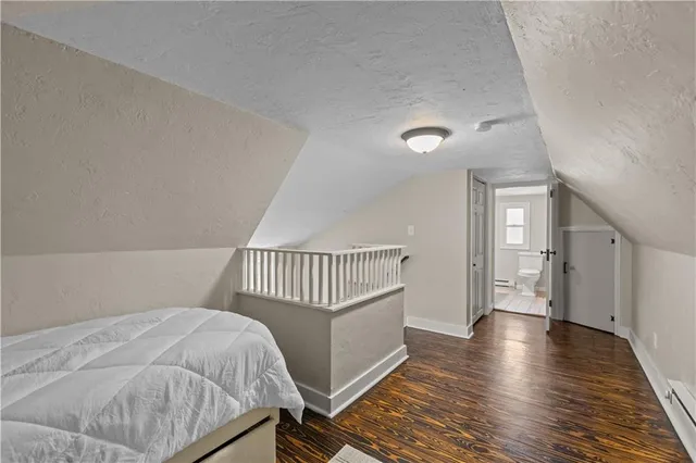 a en suite bathroom with a sink and a mirror