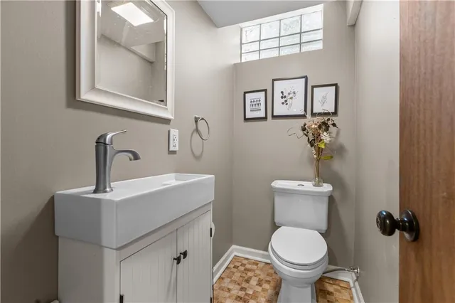 a front view of a house with yard