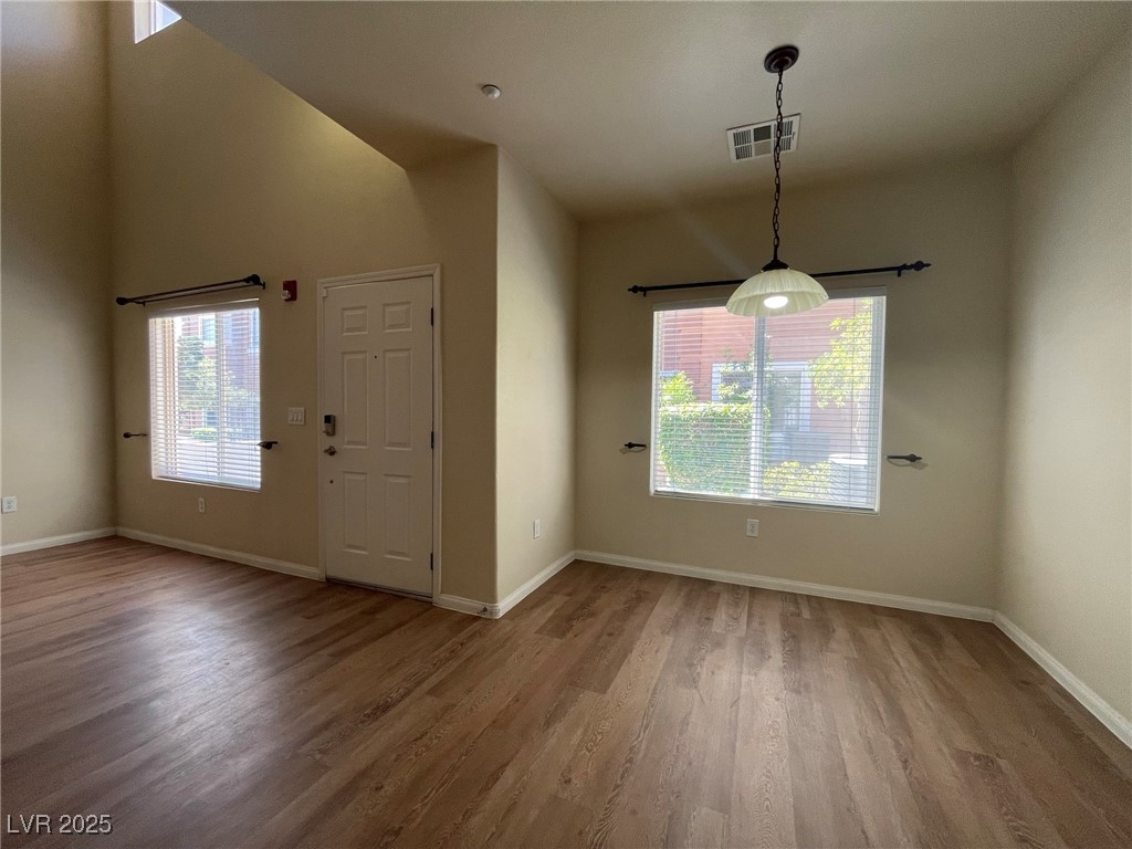 10519 Hedge View Avenue Las Vegas, NV 89129 - Photo 12 of 39 Unfurnished dining area with a wealth of natural l
