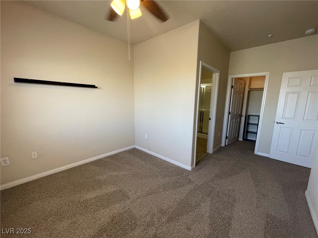 10519 Hedge View Avenue Las Vegas, NV 89129 - Photo 25 of 39 Unfurnished bedroom featuring carpet flooring, a c