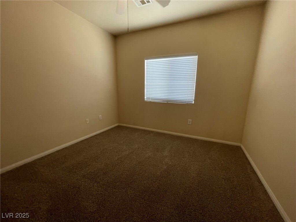 10519 Hedge View Avenue Las Vegas, NV 89129 - Photo 27 of 39 Unfurnished room with baseboards, visible vents, a