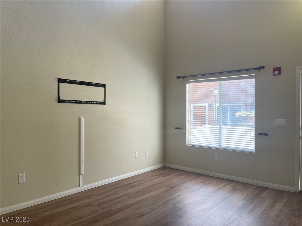 10519 Hedge View Avenue Las Vegas, NV 89129 - Photo 30 of 39 Unfurnished room featuring baseboards and wood fin