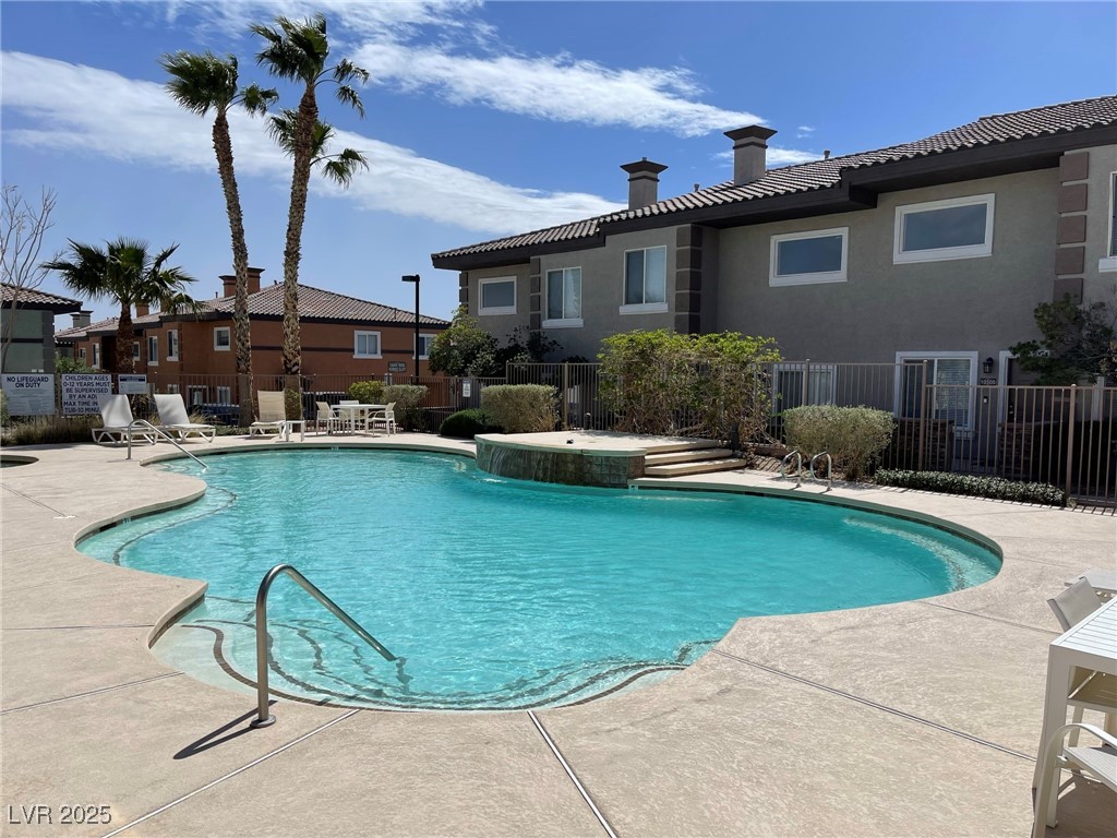 10519 Hedge View Avenue Las Vegas, NV 89129 - Photo 39 of 39 Pool featuring a patio and fence