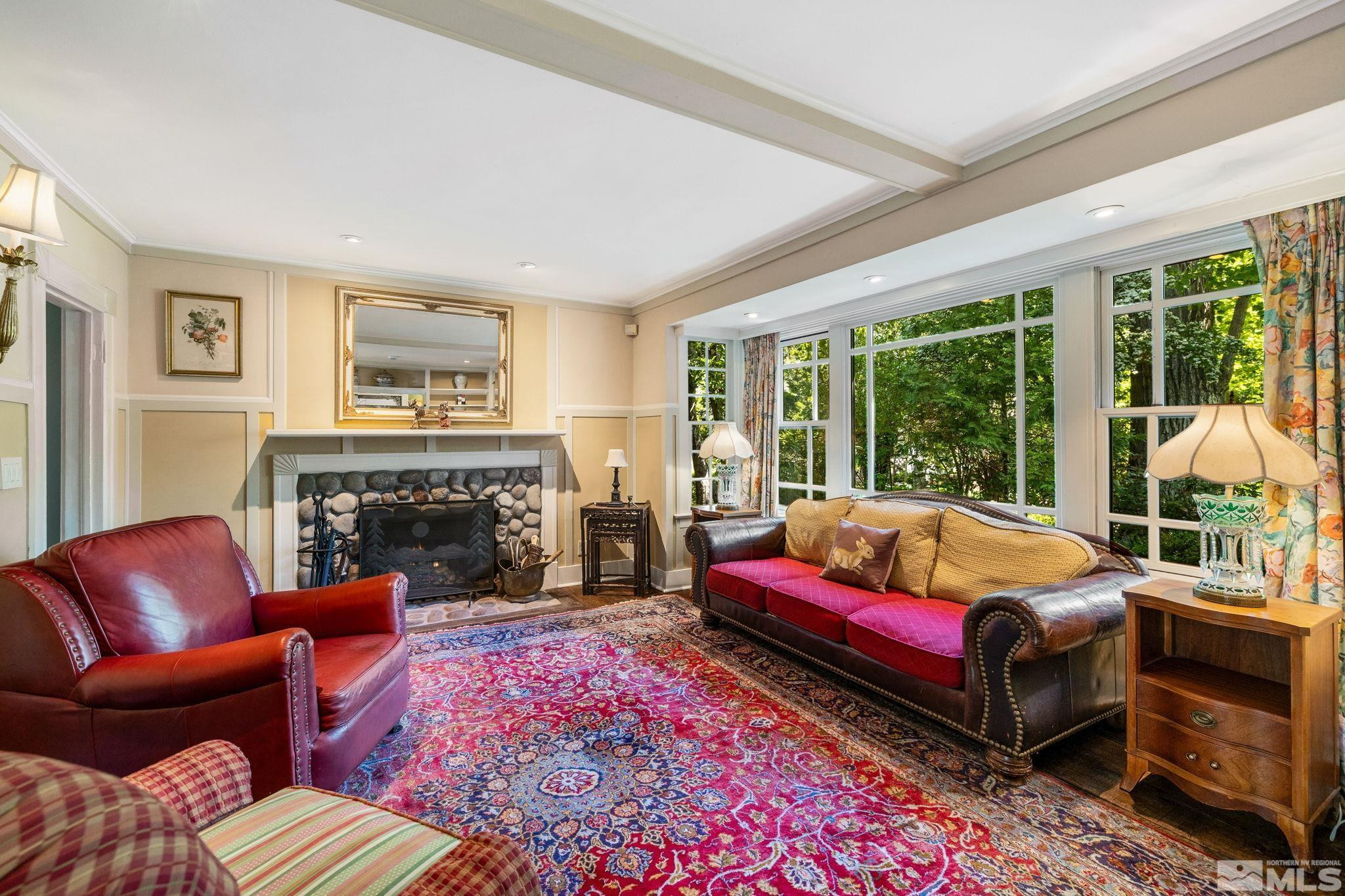 1555 Marsh Avenue Reno, NV 89509 - Photo 14 of 84 a living room with furniture and a fireplace