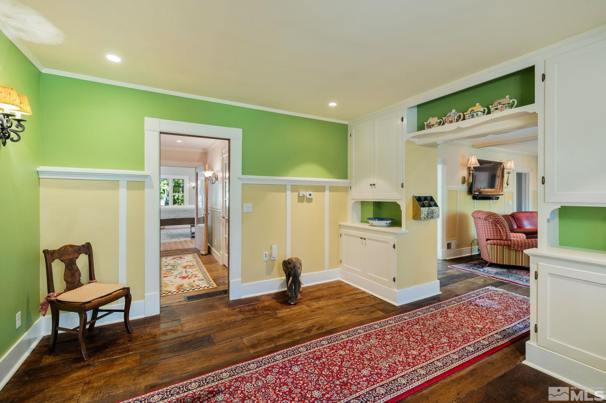 1555 Marsh Avenue Reno, NV 89509 - Photo 16 of 84 a living room with furniture and a rug