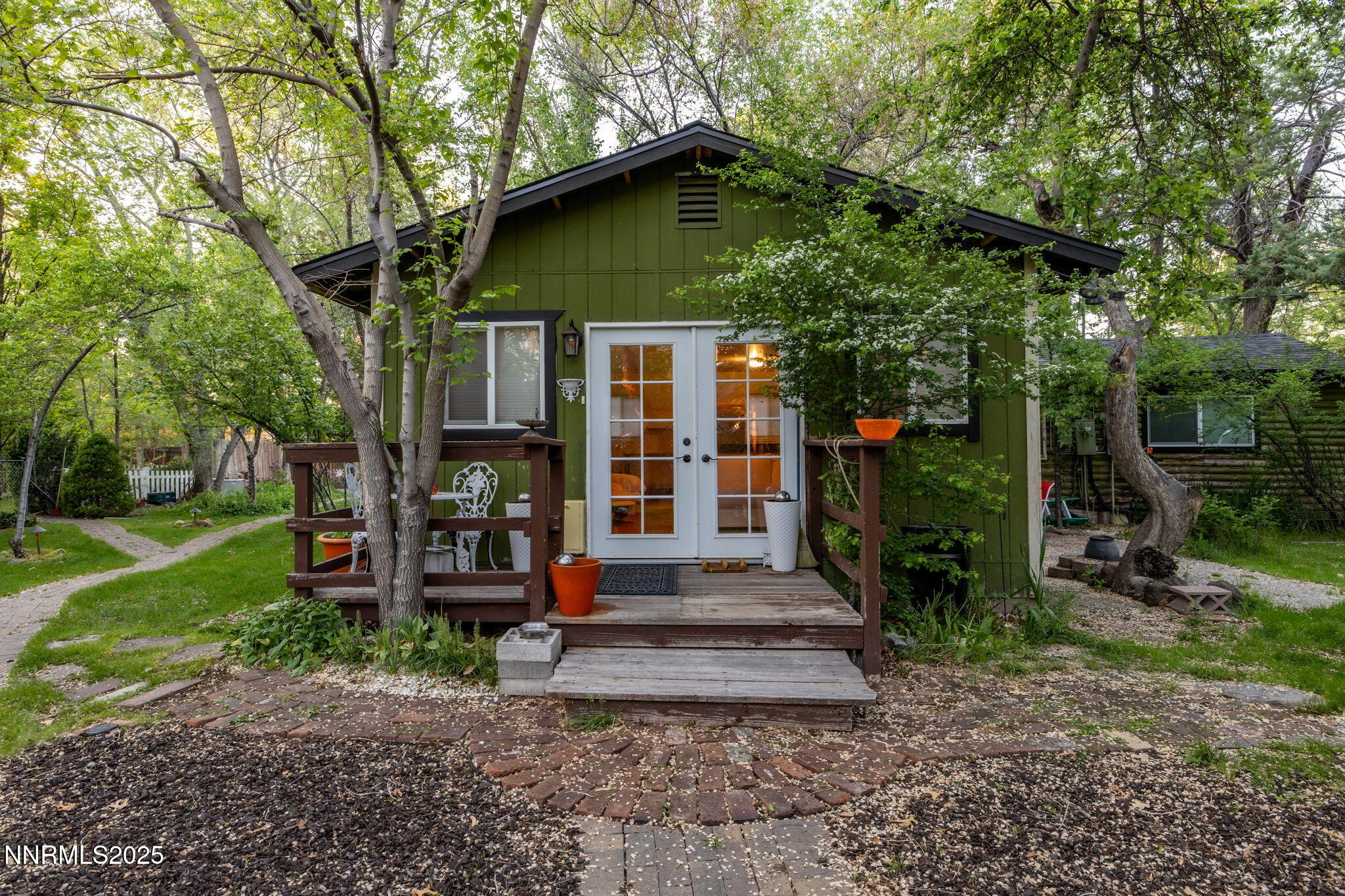 1555 Marsh Avenue Reno, NV 89509 - Photo 2 of 84 a front view of a house with garden