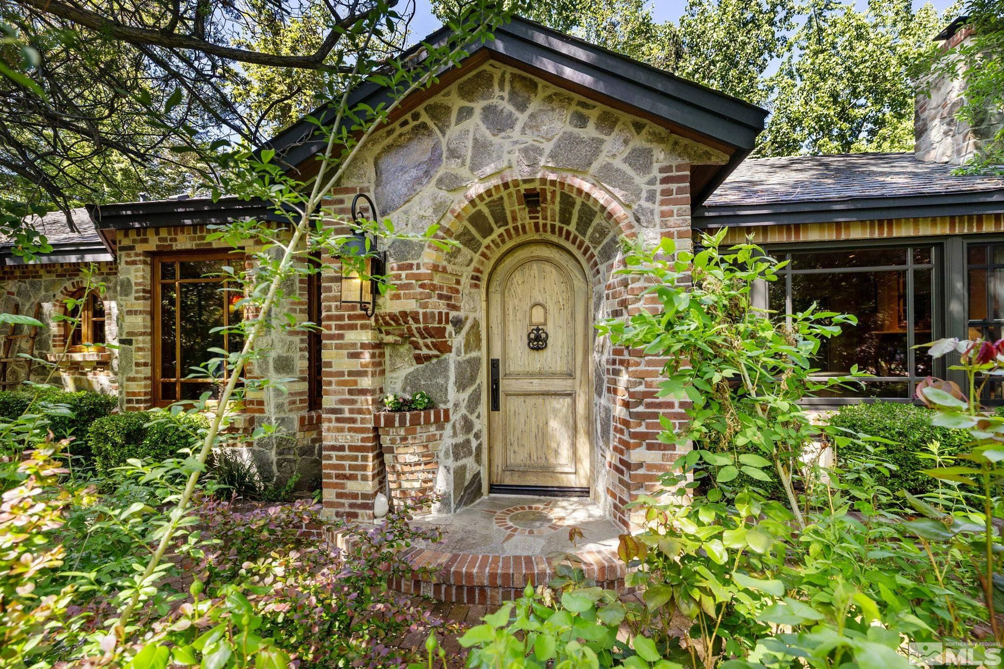 1555 Marsh Avenue Reno, NV 89509 - Photo 4 of 84 a small pool with the trees in the background