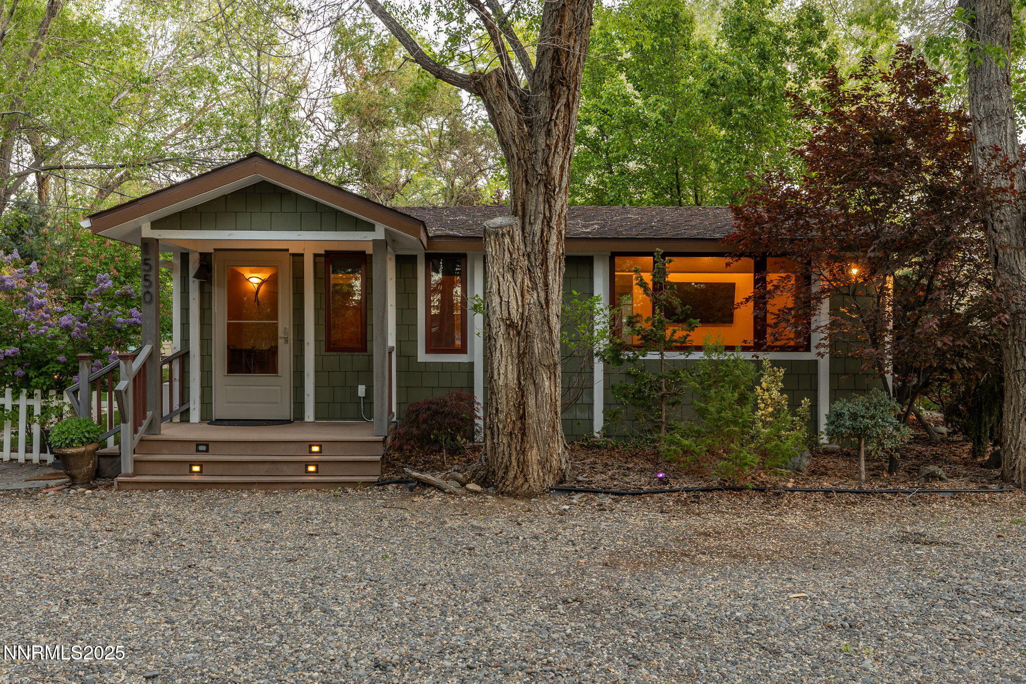 1555 Marsh Avenue Reno, NV 89509 - Photo 60 of 84 front view of a house with a large trees