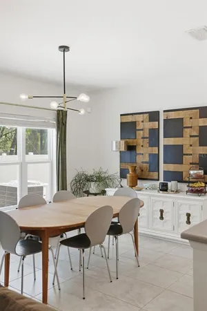 a view of a dining room with furniture