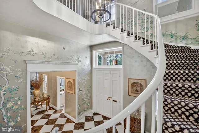 a view of entryway with wooden floor