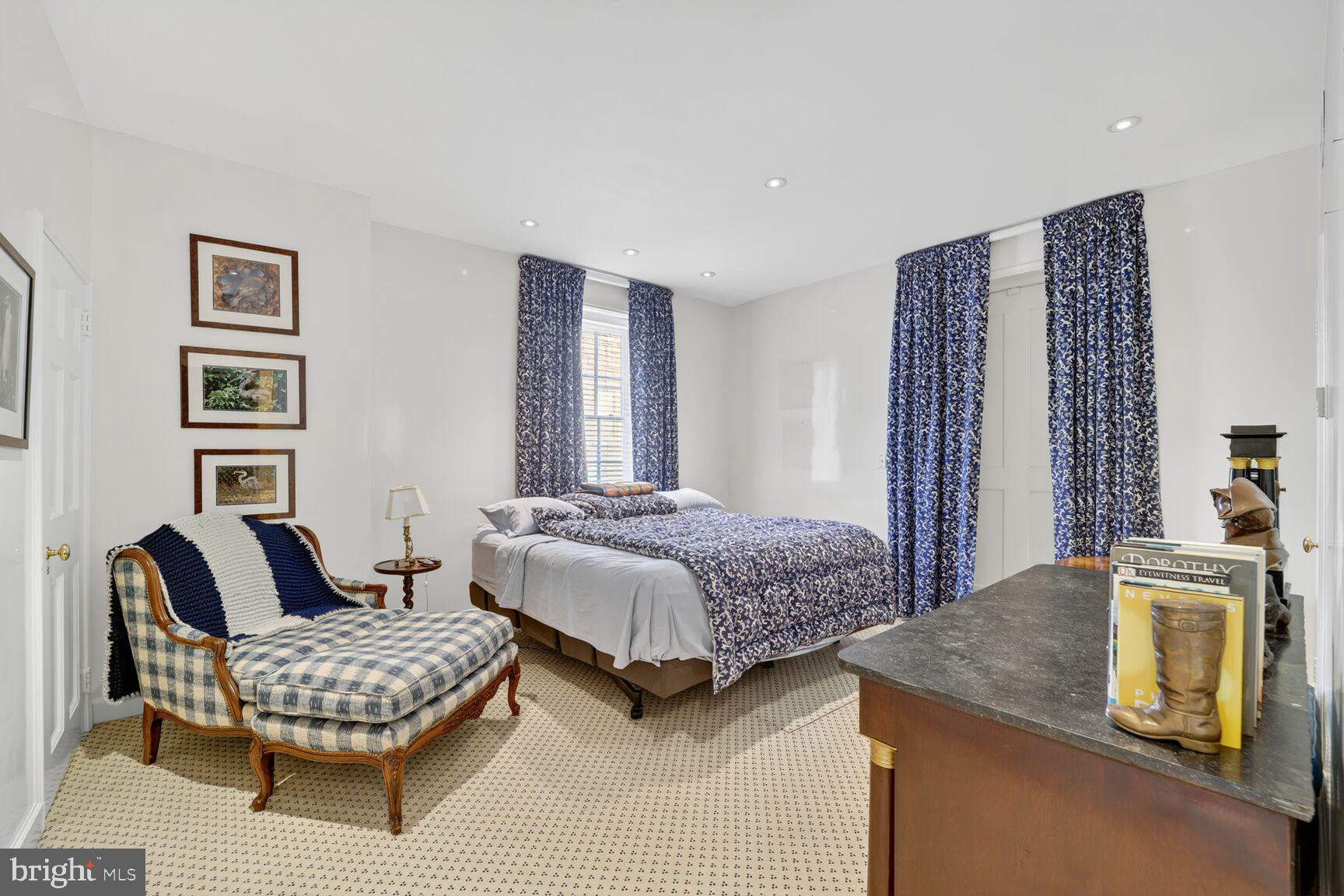 2310 Kalorama Road Northwest Washington, DC 20008 - Photo 26 of 50 a bedroom with a bed and a couch