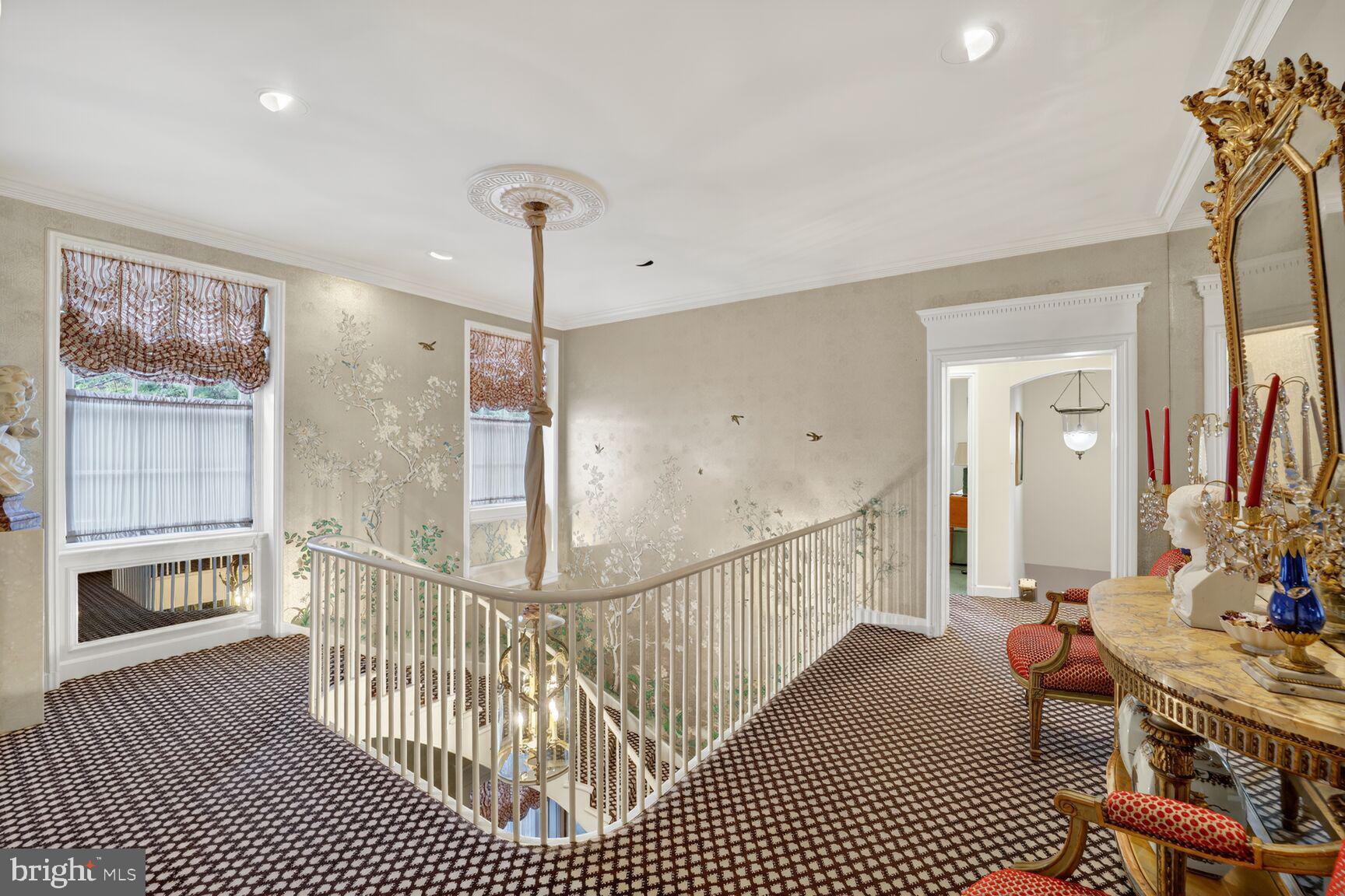 2310 Kalorama Road Northwest Washington, DC 20008 - Photo 28 of 50 a view of a hallway with wooden floor and windows