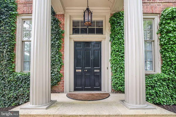 a front view of a house with a porch
