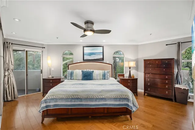 a view of a workspace with furniture and gym equipment