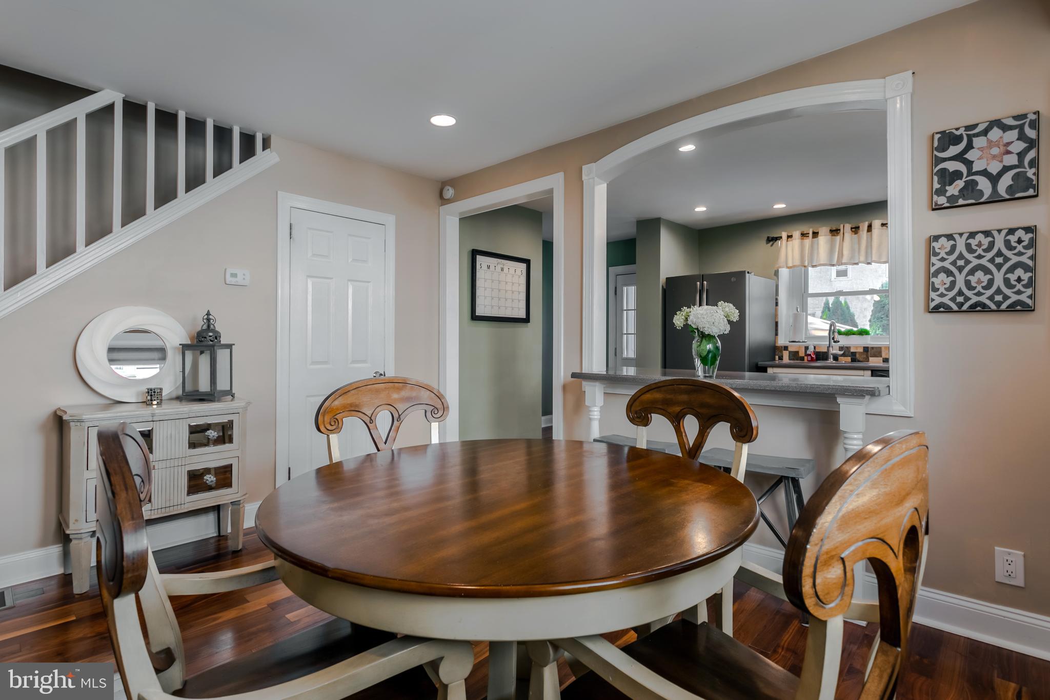 34 Greenhill Road Springfield, PA 19064 - Photo 12 of 36 a dining room with furniture and mirror