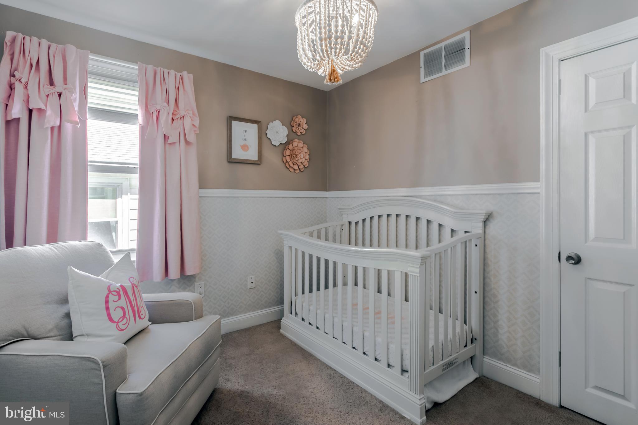 34 Greenhill Road Springfield, PA 19064 - Photo 22 of 36 a bedroom with a bed and a window