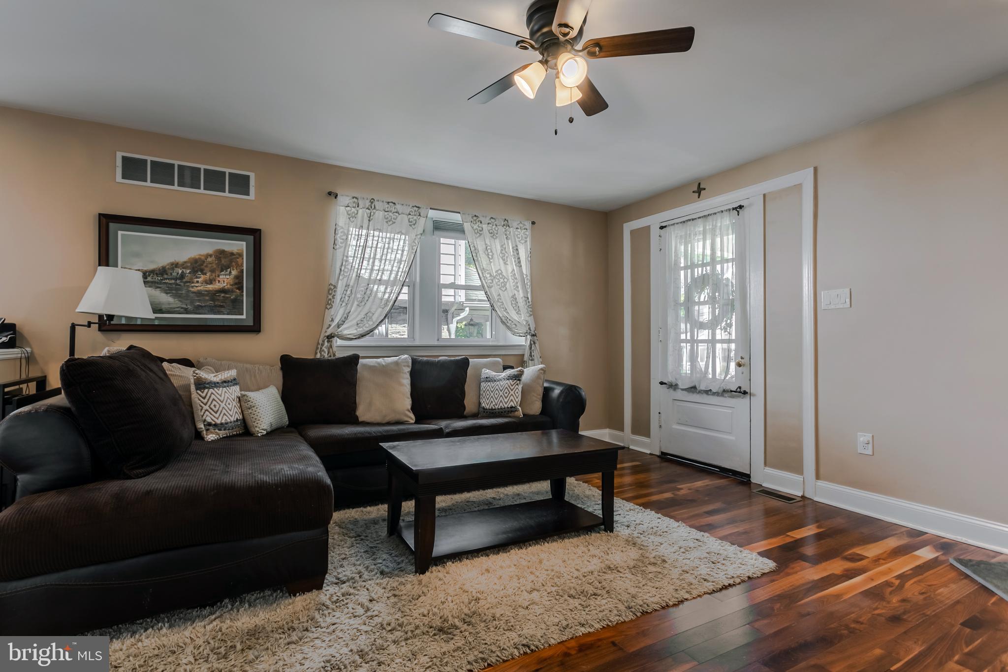 34 Greenhill Road Springfield, PA 19064 - Photo 7 of 36 a living room with furniture and a window