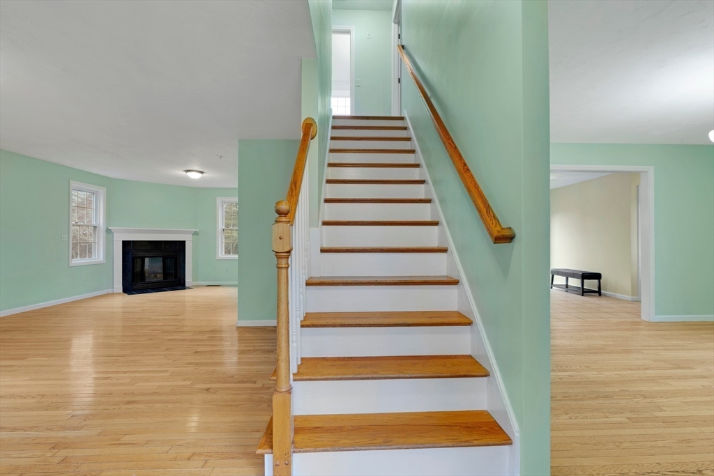 269 Tispaquin Street Middleboro, MA 02346 - Photo 12 of 40 a view of entryway and hall with wooden floor