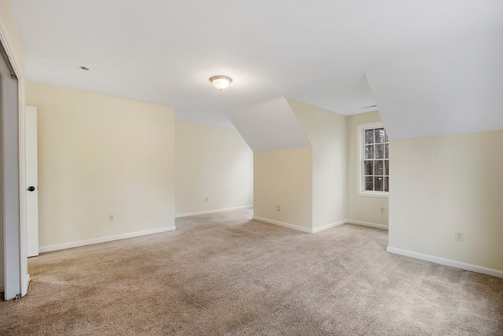 269 Tispaquin Street Middleboro, MA 02346 - Photo 17 of 40 an empty room with a natural light