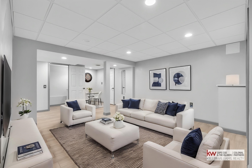 269 Tispaquin Street Middleboro, MA 02346 - Photo 20 of 40 a living room with furniture and a couch