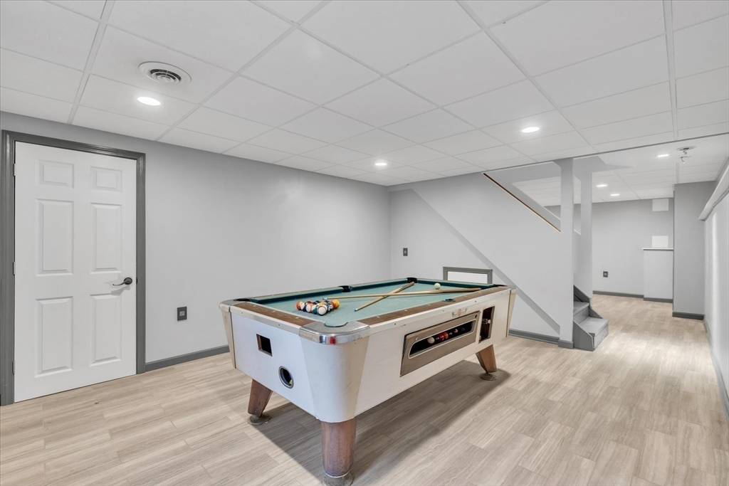 269 Tispaquin Street Middleboro, MA 02346 - Photo 21 of 40 a room with furniture and wooden floor