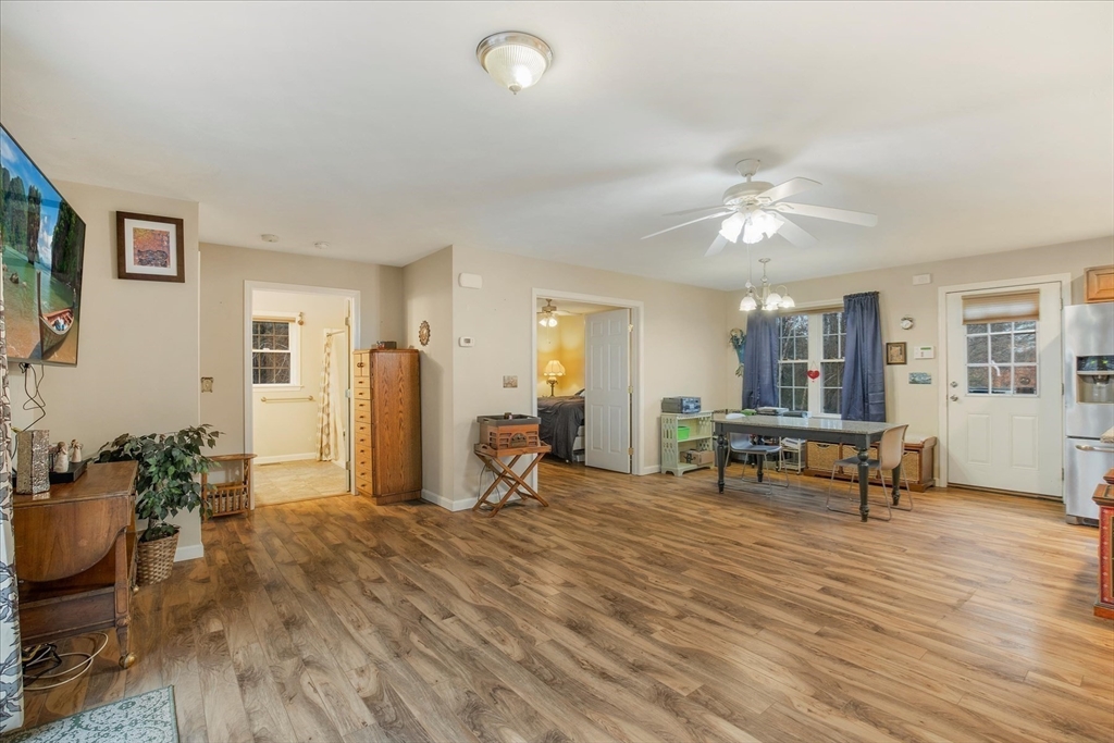 269 Tispaquin Street Middleboro, MA 02346 - Photo 29 of 40 a living room with furniture and wooden floor