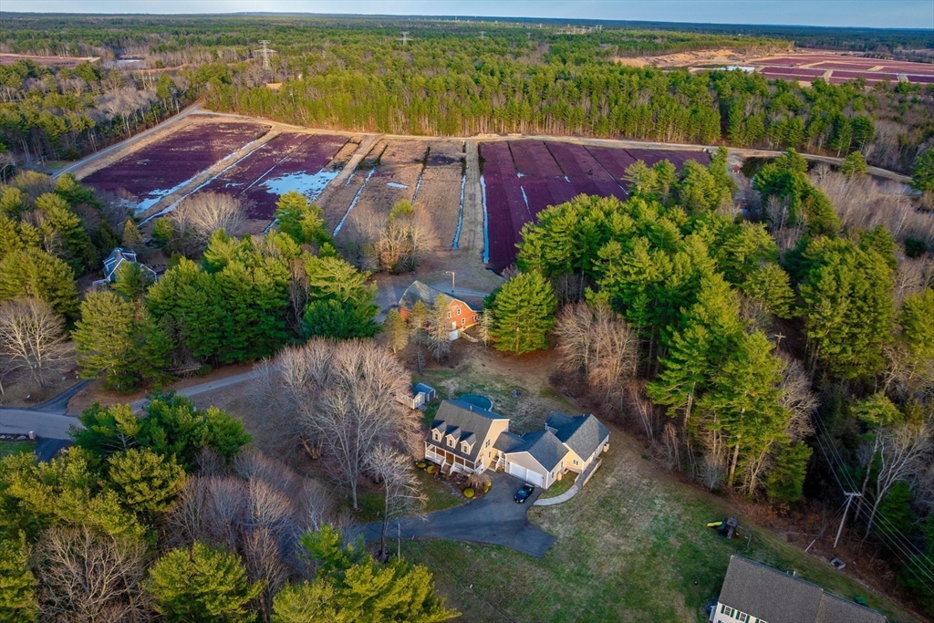 269 Tispaquin Street Middleboro, MA 02346 - Photo 3 of 40 an aerial view of a house with a yard