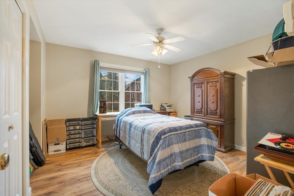 269 Tispaquin Street Middleboro, MA 02346 - Photo 34 of 40 a bedroom with a bed couch and a window