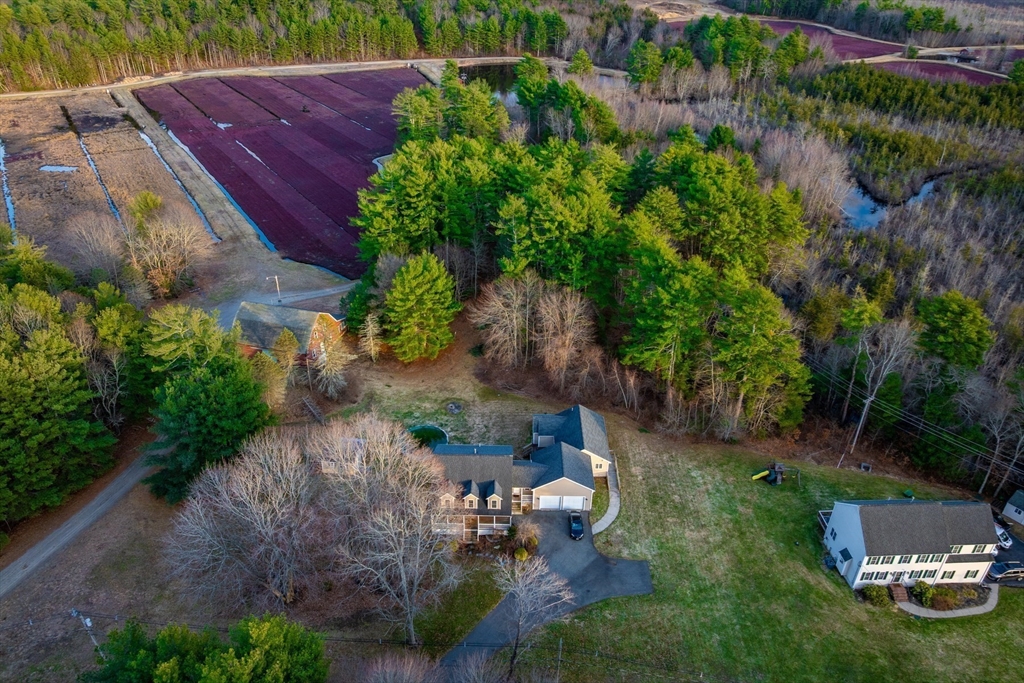 269 Tispaquin Street Middleboro, MA 02346 - Photo 40 of 40 an aerial view of a house with a yard