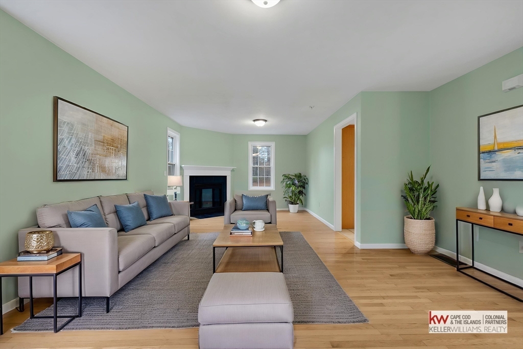269 Tispaquin Street Middleboro, MA 02346 - Photo 5 of 40 a living room with furniture and a couch