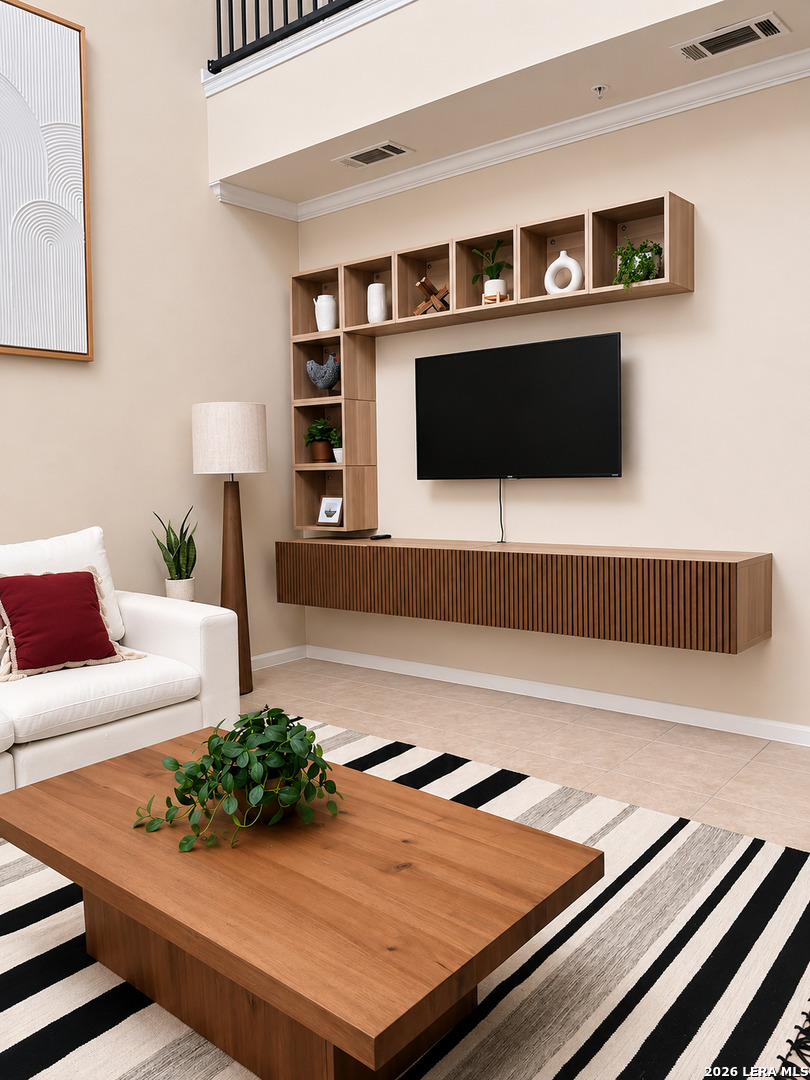 6160 Eckhert Road, Unit 804 San Antonio, TX 78240 - Photo 5 of 38 a living room with furniture and a flat screen tv
