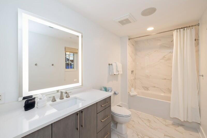136 Georgetown Avenue, Unit 3B5 Rosemary Beach, FL 32461 - Photo 12 of 22 a bathroom with a granite countertop sink toilet and shower