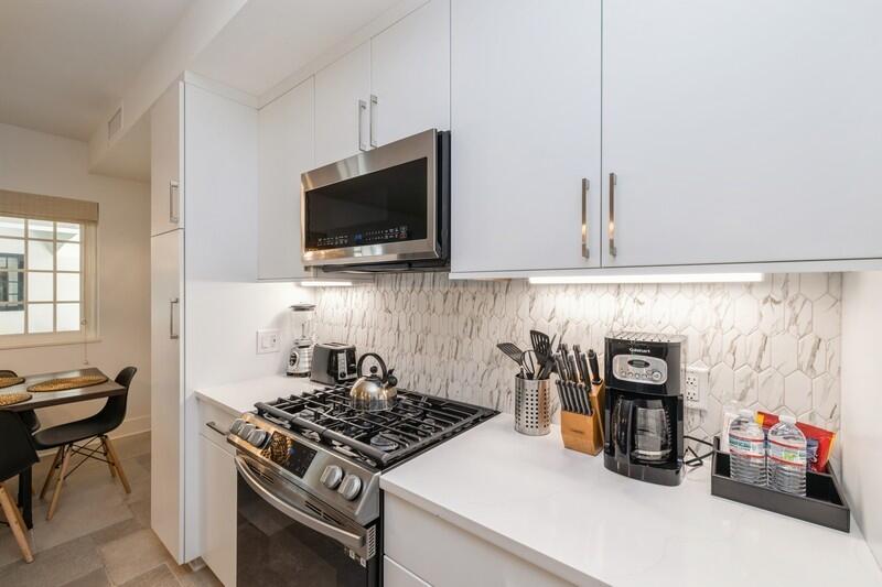 136 Georgetown Avenue, Unit 3B5 Rosemary Beach, FL 32461 - Photo 14 of 22 a kitchen with a stove and a microwave