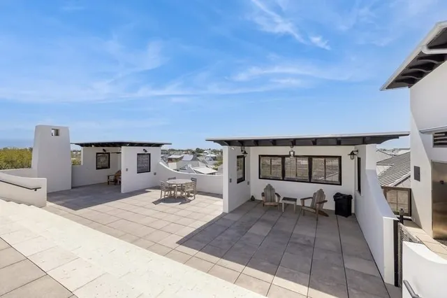 a bathroom with a sink mirror and vanity