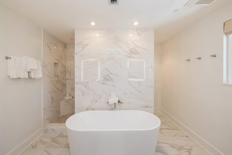 136 Georgetown Avenue, Unit 3B5 Rosemary Beach, FL 32461 - Photo 8 of 22 a white bath tub sitting in a bathroom