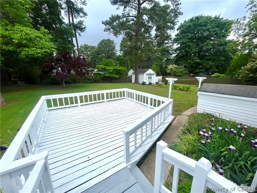 1438 Lafayette Road Gloucester Point, VA 23062 - Photo 5 of 34 Wooden terrace featuring a yard and an outdoor structure