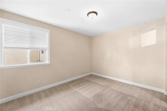 a view of a room that has a window in it