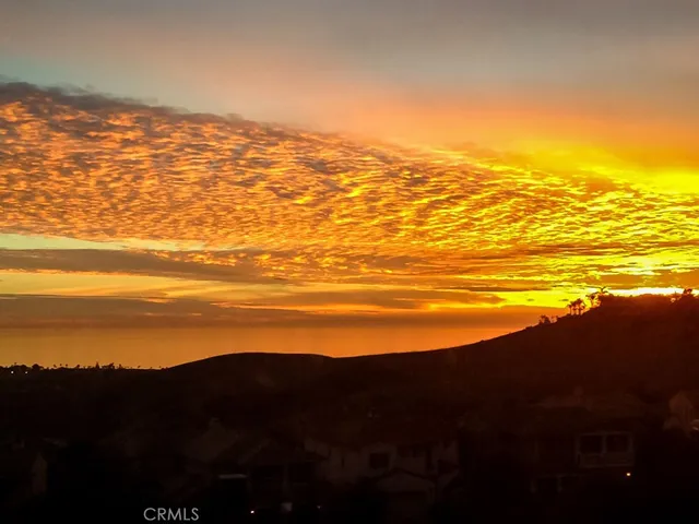 a view of a street with a building in the background