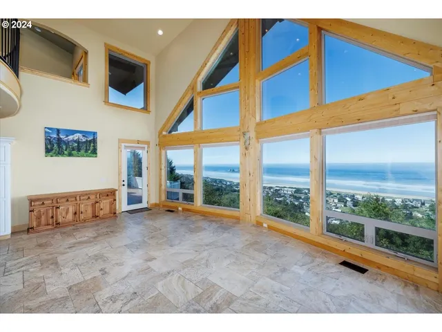 a view of an empty room with a large window