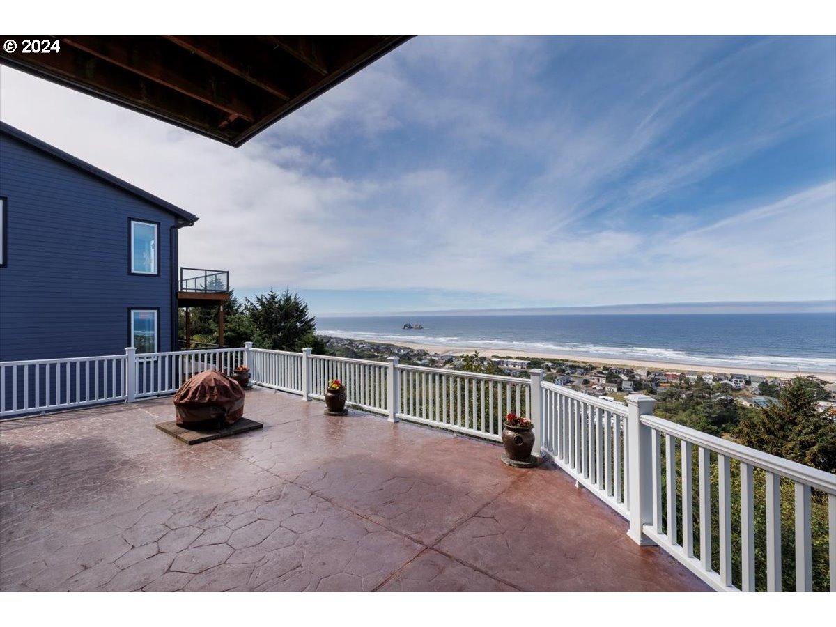 367 South Longview Loop Rockaway Beach, OR 97136 - Photo 29 of 43 a view of a roof deck with a couple of chairs