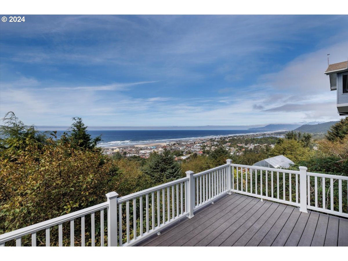 367 South Longview Loop Rockaway Beach, OR 97136 - Photo 32 of 43 a view of balcony with wooden floor