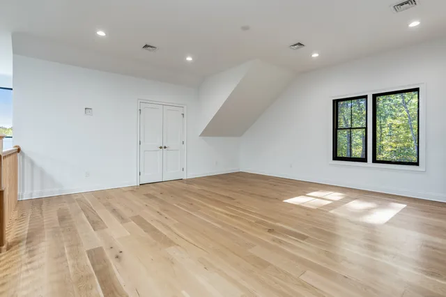 an empty room with windows