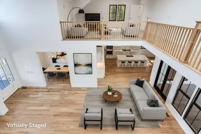 a view of livingroom with furniture and floor to ceiling window