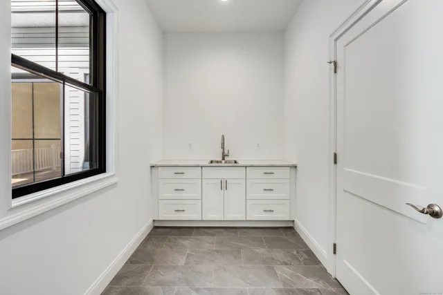 a view of cabinets and window