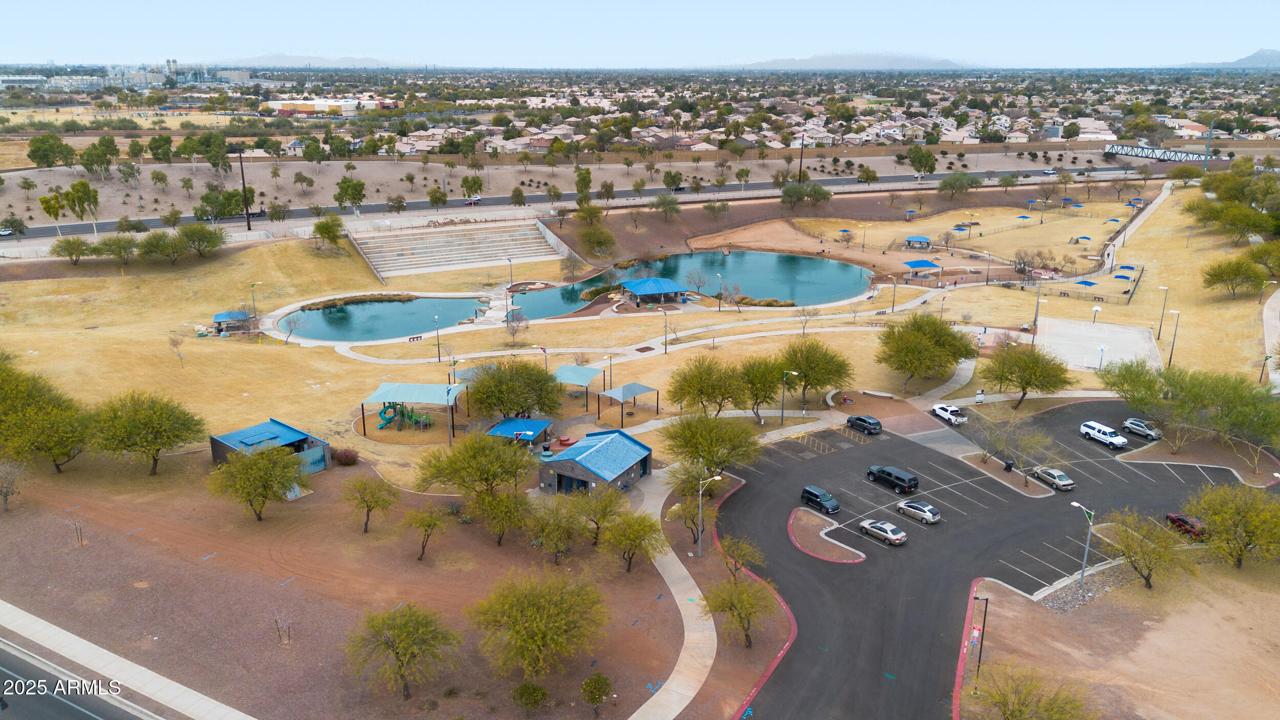 2646 East Megan Street Gilbert, AZ 85295 - Photo 32 of 40 an aerial view of residential houses with outdoor space